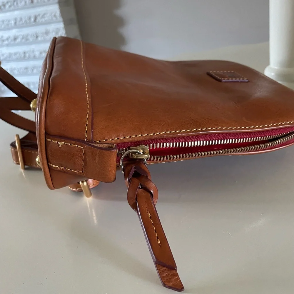 Dooney and Bourke Florentine leather small backpack.
